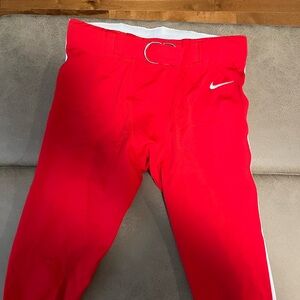 Nike men’s  Red Athletic Bottoms foot ball pants missing pads size L/xl see